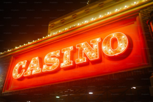 A Casino sign lit up at night